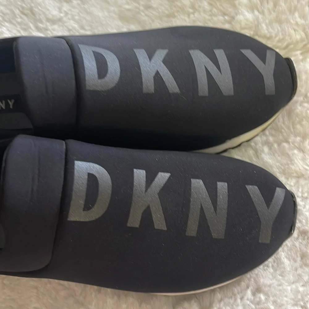DKNY Black Slip-On Sneakers with Black Shine Logo